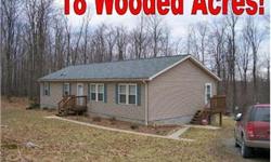 4-WHEELING ANYONE? Immaculate 3 bedroom 2 bath home with fireplace, full basement and rear deck would be excellent for year round or vacation home. Enjoy the 18 wooded acres with 4 wheeler trails throughout offering a private location at the end of the