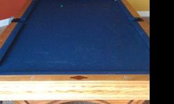 7' pool table solid wood 3 piece slate great shape. Comes with balls and some sticks w/rack