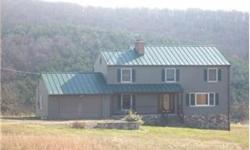 Beautiful Country setting with Large 4 bedroom, 2 1/2 bath home on 7 1/2 acres. This home has separate dining room, den, large kitchen, deck off the master bedroom, walkin closet, jet tub and sep. shower off the master bedroom. Also home has built in