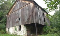 Picturesque building lot in rural Milford Twp. Gently Sloping Terrain and an abundance of mature trees create a majestic and tranquil environment. Included is an original Bank Barn dating back to mid 1800's. Barn could be restored or pieced out for value