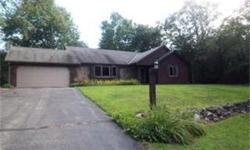 Well maintained RANCH home on private 3.45 acre wooded lot! Spacious living room offers natural fireplace & opens to dining area. Patio doors in kitchen lead out to BIG deck overlooking park-like yard where nature abounds! Master bedroom has double