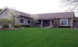 The back lot line adjoins the Kettle Moraine State Forest providing direct access to some of its many amenities. Located on a cul-de-sac, this 4 bedroom, 3.5 bath ranch home was custom designed for this lot with a walk out lower level. It is just 10 years