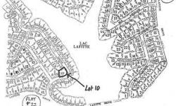 Gently-sloping second-tier building lot at Terre du Lac with partial view of Lac Lafitte. Paved road. Build your home here and have access to multiple lakes for fishing, boating, swimming, and water fun! Put-in for Lac Lafitte (37 acre ski lake) is just