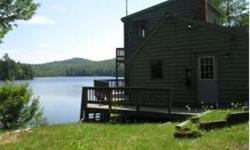 Quiet 98 acre Pond for fishing, canoeing and swimming.This is truly a waterfront home, sit on the deck and enjoy the serenity,clear water and sandy shore.New kitchen and appliances,pine floors and walls. Several wood stove to back up the baseboard