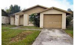 Cheap Repo. Yes you got that right.. This is a bank owned home at a great price in the Carrollwood area. Close in to down town and the airport. This home is a 3 bedroom 2 bath with a one car garage on a small pond. You have 2 orange trees in the back yard