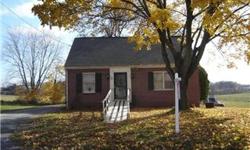 Great Home! All Brick Rancher Featuring HWD Floors under Carpet, Oil Heat, Central Air, Eat in Kitchen. Full Basement, Attic has space for 2 more Additional BedRooms. Large Storage Shed. Excellent home located just out side of town.Zoned Commercial and