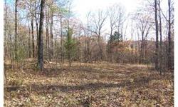 Vacant wooded property w/ paved road access. Close to I-540 at Chester. Road throughout property. Great spot for hunting, homesite or cabin. Gated access. Survey in file. Property has been spilt into 24 separate tracts but is being sold as a whole.