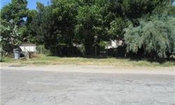 Nice corner lot of almost and acre with fenced pasture and 2 mobile homes that need work. Cul de sac street about 5 miles to downtown, amenities close by. Shared well and easement driveway on edge of property with the neighbor. Tall trees. Zoned R-A-M.