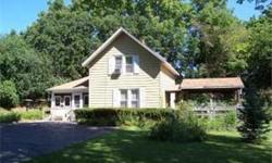 Nestled in the rolling, wooded Kettle Moraine Forest, this renovated farmhome with newer mechanicals is waiting for you! Includes the well designed original barn with a heated workshop in the lower level. Perennial gardens bloom from spring to frost, and