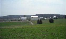 Approx. 180 acre farm with access to both Coppermine Rd and Whiskey Springs Rd. Property is improved with 2 story farm house, bank barn, dairy barn, metal frame shed, 3 silos, and several outbuildings. Approx. 120 acres tillable, 50 pasture, and 10 wooded
