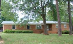 Conveniently located, spacious 3 bedroom brick ranch. Living room, dining room and den with masonry fireplace and gas logs. Kitchen appliances including range, dishwasher & refrigerator. Hall bath with double vanity & ceramic tile tub surround, pull down