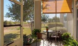 A huge Great Room opens to a gorgeous Screened Porch at this outstanding Sun City Texas Magnolia Garden Home, backing up to a rolling greenbelt, alive with Texas Native Plants. The year-around beauty of the wonderful view is also seen from triple windows
