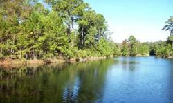 Great buy on a nicely wooded LAKEFRONT homesite in desirable Stillwater subdivision. This .59 acre site has 150' of frontage on the lake and is sure to provide great views when planning your new dream home! Stillwater is a gated, peaceful, secluded newer