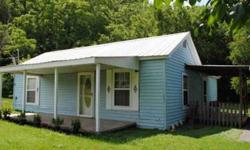 CHECK THE PRICE! 5+ acres, barn, 30x40' garage, 2 covered porches, strg bldg, peaceful countryside. 10 yr old roof, replacement windows (except laundry), wiring/plumbing 10yrs, jacuzzi tub, low water toilet, crown mouldings, huge kit w/nice cabinets.