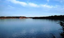 55 feet of Medina Lake frontage with awesome views of Medina Lake. Property has path down to the lake, electricity installed onsite & RV hook-up, sewer system tap in place and water tap in place. This property is ready to build your dream home or come