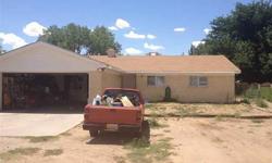 Enjoy Country Living with Conveniences Only Minutes Away! Huge Backyard. Large home, featuring 4 bedrooms, 2 baths and over 2000 sq ft. Needs some work.Listing originally posted at http