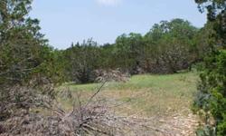 HILL COUNTRY LAND AT ITS BEST ! Rolling tree covered land w/seasonal creek meandering through it. Covered in Cedar Elms & numerous other species of hardwoods. Several beautiful building sites. Easy access to S.A., Boerne & Bandera but very private.