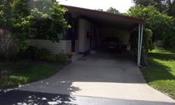 A very well kept double wide manufactured home.....see it.
