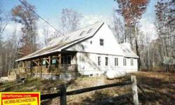 3 bedroom, 2.5 bath home on 10.14 acres! Features over 3000 square feet! Home is partially finished, waiting for your special touches! Home is constructed with Cordwood Masonry and sits in a quiet secluded setting! Wildlife galore! Full unfinished