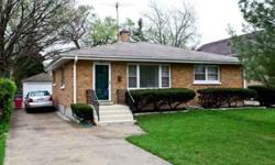 CUTE AS A BUTTON THIS LOVELY HOME OFFERS HARD WOOD FLOORS LARGE LIVING RM AND DINING ROOM EAT IN KITCHEN 3 GOOD SIZED BEDRMS 1 FULL BATH AND A POWDER ROOM IN THE PARTIALLY FINISHED BASEMENT DETACHED 1 1/2 CAR GARAGE FENCED YARD AND LARGE BACK YARD CUTE AS