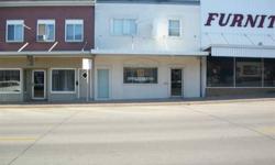Spacious office building located on Main St. in Dyersville. The upper level is currently used as office space but was previously an apartment and has privateaccess from the street. The main level has 3 office spaces plus a large reception area.Listing