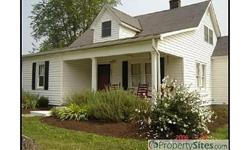 This country home has had many updates. The house has hardwood throughout, with ceramic tile in bathrooms and mudroom/laundryroom. The master suite includes an amazing walk-in closet.