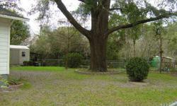 4 Br 2 B home within the city limits of Live Oak on a large fenced lot with a new roof and renovations. There is a detached workshop which has hook up for water, gas, electric and cable.Listing originally posted at http