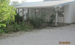 HOME, TWO SHOPS in Plainview DistrictNEED IT GONE- 2BR/1B on 7/8 of Acre. 1100 sqft, vinyl siding, metal roof, inside remodeled recently, 10x24 covered porch. Ardmore address but Lone Grove phone, cable, SOWC & total electric. Chainlink completely around