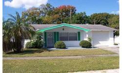 This is a TWO Bedroom and TWO Bath home in Forest Hills.Conservation and Pond across the street make sitting out on your patio a Florida delight. A screened in Lani in the back over look fruit trees. Very close to shopping and restaurants. This home is