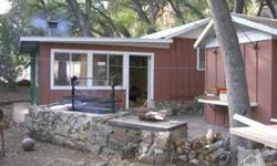 Small Country Cabin on 2 acres. Cabin is located in Matilija Canyon. Property is part of a large 200+ acre land partnership where each of 55 owners in the partnerhip has 2 or more acres. This is a very wilderness setting about 15 minutes outside of Ojai.