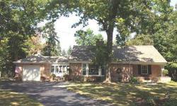 Orchard Hills - Charming brick ranch, full of character on two large park-like homesites. Built-in bookcases and china cabinet, fireplace, spacious great room, dining room, some hardwood floors, well maintained. Screened porch, beautiful English garden,