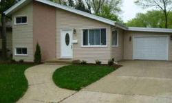 Gorgeous remodeled 3 Bedroom, 2 Bath Split Level! The list of improvements includes new roof, windows, & siding. Home features updated kitchen & baths, new appliances, new carpet, doors, floors, & lighting. The list goes on! Nothing to do but move in!