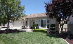 This is a pristine home in one of Modesto's most asked for gated communities......Autumn Glen. A lovely two bedroom home with a sitting room, right off of the beautiful master,that exits to the private patio. Master bath has separate tub and shower and a