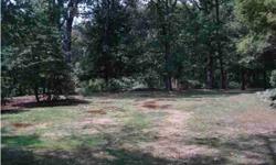 Gorgeous building lot with a few large hardwood trees situated in a very desirable neighborhood. 150'x210'. Lot slopes gently, has level area. Property has been divided recently. Survey attached is correct for Lot 502. Survey stakes are visible. Abandoned