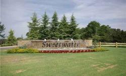 Serene two acre(mol) wooded homesite in an exclusive access controlled community.