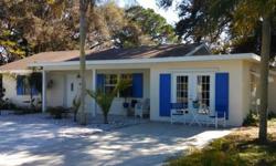 Key West Style! Clean & Comfortable 2 Bed/2 Bath Lakefront Home Features Granite Countertops, Stainless Appliance Package, Jacuzzi Tub, Fresh Coat of Paint(Inside and Out), 2 HVAC Systems, and a Natural Stone Wood Burning Fireplace. The 3 Spacious Wooded