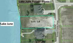 Lovely lake front lot directly on Lake June in Winter - Highlands County's premier lake! This fantastic lot is in the gated upscale community of Lake June Pointe! Enjoy all of the activities this sand bottom lake has to offer - swimming, sking, fishing