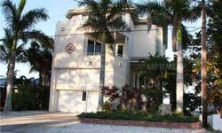 Once in a lifetime opportunity to own a piece of paradise.This tastefully appointed,furnished waterfront home is located on beautiful Tampa Bay at the Bean Point pass at the Gulf of Mexico. Lazy afternoon naps on either of the two balconies while