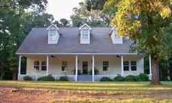 Enjoy this well kept wonderful private home on an acre in a Lake Martin water access community. The ceilings in the Great Room & Foyer are 20 ft. Beautiful 3/4'' solid oak hard wood flooring in the great room & dining room. Two master suites & relax in