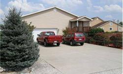 Car collector? Home business? This is the home for you! Garage bays to park 5+ vehicles. Huge kitchen and dining area with plenty of cabinets, all appliances stay and attached pantry. Nice, large family room with great natural light and a great view. Big
