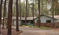 Pinetop Country Club Home on a beautiful lot. This 4 bedroom, 3 bath home has guest quarters off of a hobby room. Aspen T & G ceilings, Rock Fireplace, fenced and landscaped yard with a paito and grill that is great for entertaining. Lots of storage, Rv