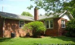 --Charming 1938 2 bedroom, 2 bath brick home 20 minutes from Asheville. Great pine floors, family room, 2 car garage, lots of outbuildings. Great 12x14 studio building just outside the back door. Two lots, house sits on .52 acres, and includes additional