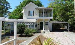Quiet corner in Historic District Overlooking Lake Dora. Home & Cottage have been tastefully updated. Possible In-Law & Guest income pot. Main House currently has 2Bd/1Ba unit downstairs and a 1Bd/1Ba unit upstairs.Closed in doorway under stairwell