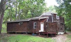 Located at 4605 Upper Twin Road, hidden in the wooded, rolling hills of western Ross County, this rustic 3 bedroom, 1 full bath hunting/camping cottage boasts a private 6.44 rolling acres of lush woodlands and joins the sought out Mead Hunting Reserve!