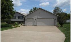 Splendid Split Plan. Live large in this beautifully designed split level home situated on a 1.14 acre level lot. You will feel right at home in this 4 bedroom 2 1/2 bath home with sophisticated upgrades. Open kitchen with oak cabinets, granite counters,