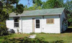 Cute 3 bedroom cottage, fixer upper on almost 1 acre (.82ac). Bring your investors, this one will stay rented. There is a mud room/utility room in the house with washer/dryer connections.
Listing originally posted at http