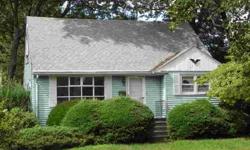 WOW! What an opportunity. Great Starter Home in quiet tree lined neighborhood. Walking distance to shopping center, everything within your reach. Great schools, convenient to NYC commute Loads of potential in this sun filled Cape Cod. Hurry this one wont
