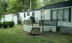 I have a 1972 homette 2 bedroom (or one large bedroom and an office whichever you prefer) mobile home for sale.it is white and black. it has an extension off the living room, in the living room there is a wood burner nice for the winter. in the restroom