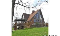 PRIVATE! New hickory laminate flooring. If you are looking to live in the woods in a beautiful Large Double A-Frame home on approximately 9+ acres in Morgan County, OH. Here it is! Property includes natural gas well providing free gas for the home. Inside