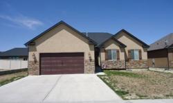 Fully finished ranch style home built by Amundsen construction in 2009. Upstairs has 3 bedrooms, 2 full baths, laundry room off garage, kitchen, living room and dining area. Baement offers 2 large bedrooms, bath, large family room with surround sound and